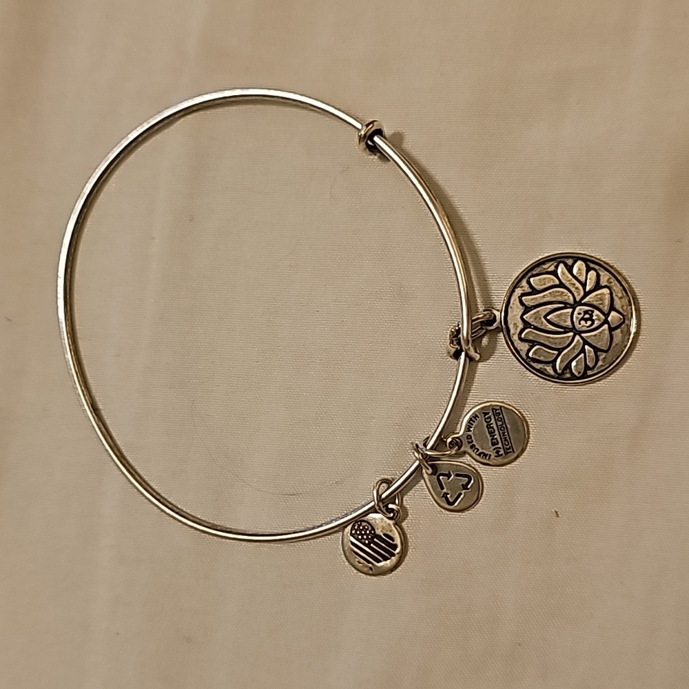 Alex and Ani lotus charm bracelet. Several available will b…